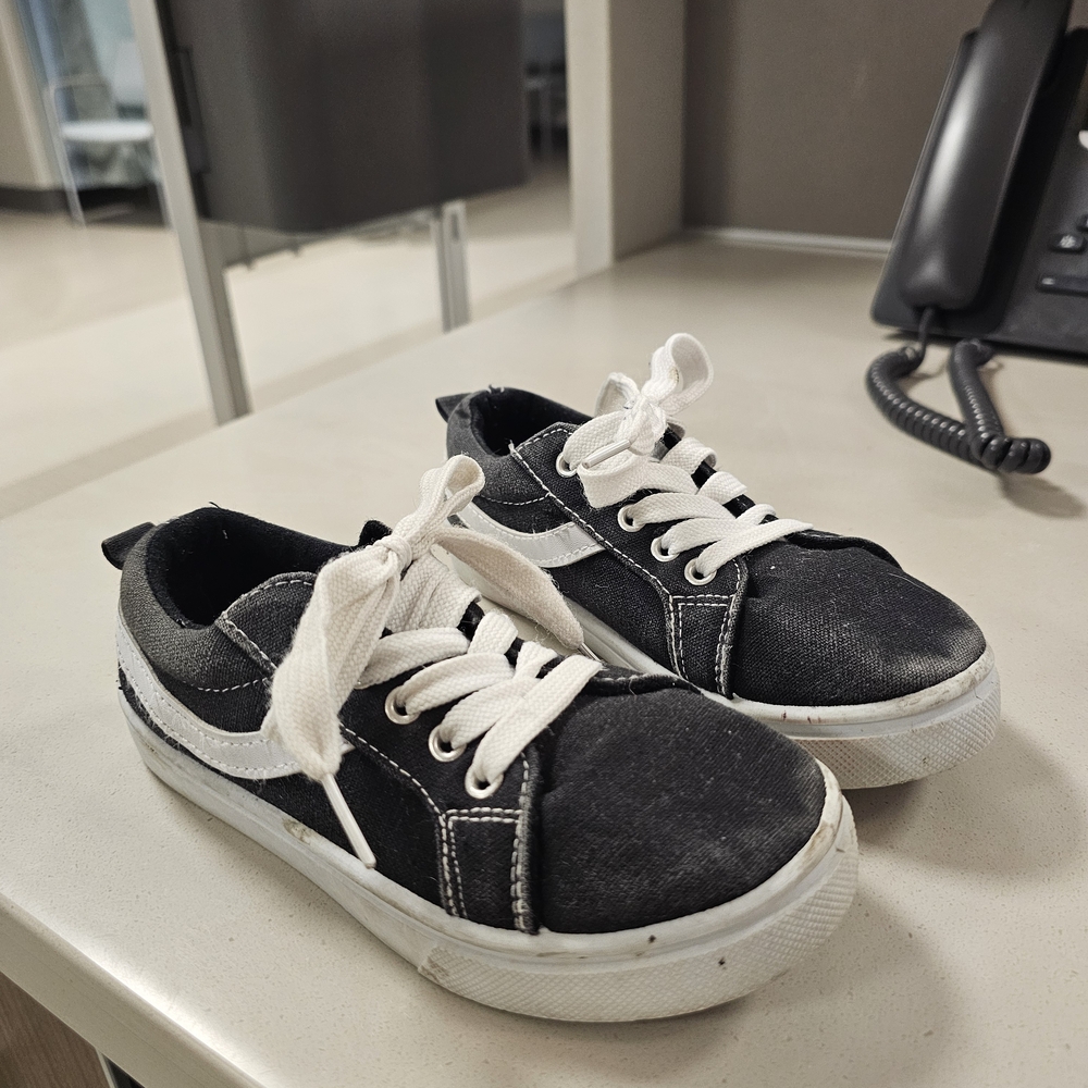 Vans Kids canvas Black and White Classic Sneakers.